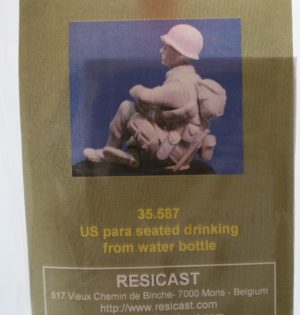 US para seated drinking from water bottle