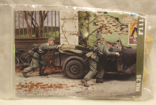 Soldiers pushing on a vehicle (wehrmacht)