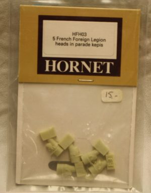 5 French foreign legion heads in parade kepis