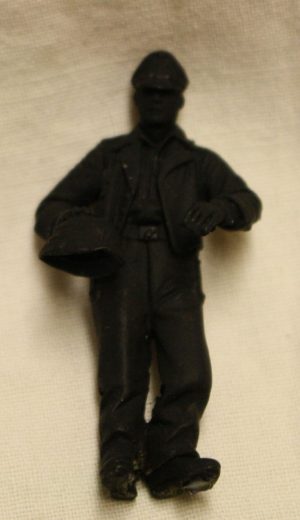 WW2 German with hand on Helmet